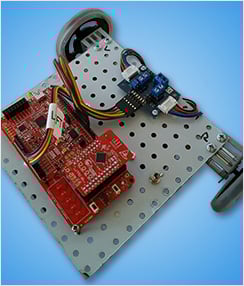 BLE chip with two wheels and an H-bridge Image of BLE chip with two wheels and an H-bridge