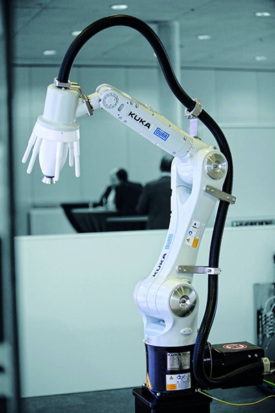 Painting system from Dürr Group and KUKA Robotics Image of painting system from Dürr Group and KUKA Robotics