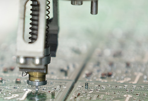 Tool heads for affixing surface-mount technology (SMT) subcomponents to a board Image of tool heads for affixing surface-mount technology (SMT) subcomponents to a board