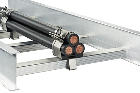 Panduit’s Trefoil cable cleats installed using a mounting bracket Image of Panduit’s Trefoil cable cleats installed using a mounting bracket