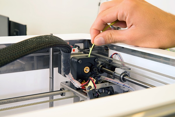 Additive-manufacturing machinery based on FDM Image of additive-manufacturing machinery based on FDM