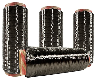 Bobbins of carbon fiber in a fiber-production facility Image de bobines de fibre de carbone dans un site de production de fibres