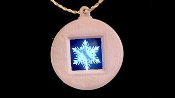 Frozen-Inspired Animated Pendant with Temperature Sensing image of Frozen-Inspired Animated Pendant with Temperature Sensing