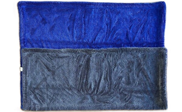 Dual weave drying towel folded to show both sides
