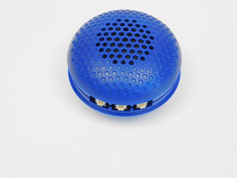 Removing the rubber reveals tactile switches on side